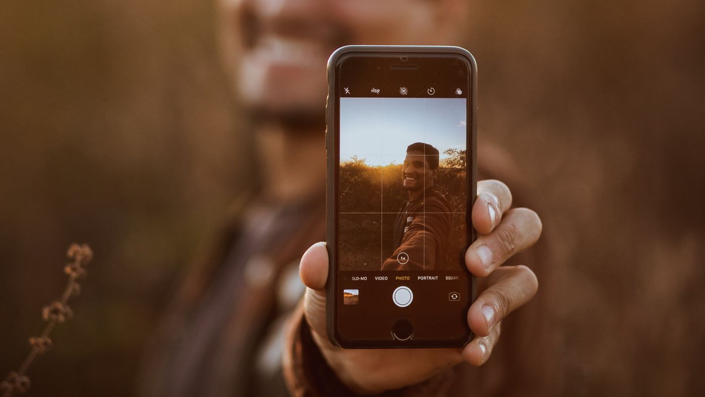 Como desativar o clareamento de fotos no iPhone 13?